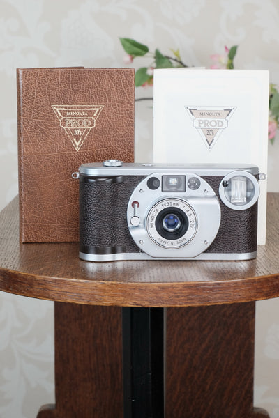 Minolta 35mm Prod 20’s Cult Camera with Original cap, pouch & instructions. - Minolta- Petrakla Classic Cameras